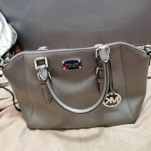 Michael Kors shoulder or hand held purse pewter color